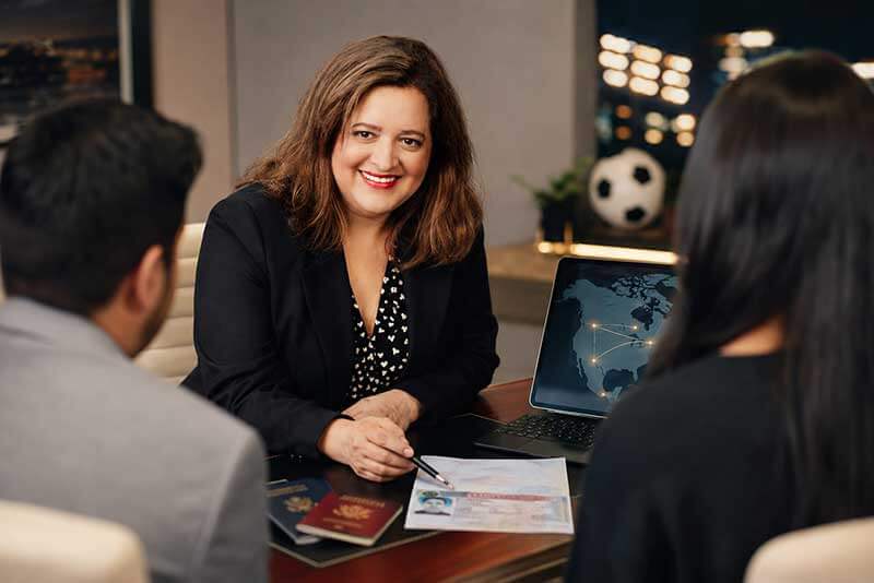 Immigration attorney advising clients about a visa for the 2026 World Cup